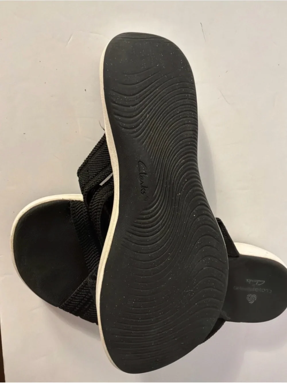 Clarks Black Crisscross Slide Sandals with White Midsole